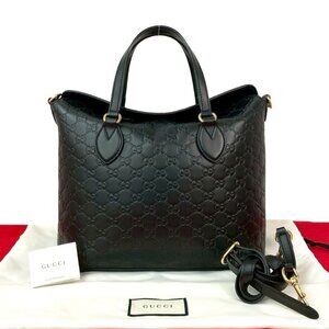 Guccissima Logo Pattern Embossed Leather